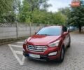 Красный Хендай Санта Фе, объемом двигателя 2.4 л и пробегом 200 тыс. км за 13999 $, фото 1 на Automoto.ua
