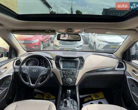 Красный Хендай Санта Фе, объемом двигателя 2 л и пробегом 125 тыс. км за 18800 $, фото 8 на Automoto.ua