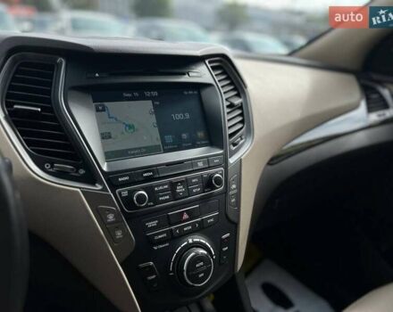 Красный Хендай Санта Фе, объемом двигателя 2 л и пробегом 125 тыс. км за 18800 $, фото 12 на Automoto.ua