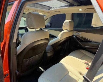 Красный Хендай Санта Фе, объемом двигателя 2 л и пробегом 50 тыс. км за 12500 $, фото 15 на Automoto.ua