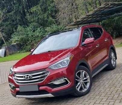 Красный Хендай Санта Фе, объемом двигателя 2 л и пробегом 57 тыс. км за 12500 $, фото 1 на Automoto.ua