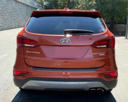 Красный Хендай Санта Фе, объемом двигателя 2 л и пробегом 50 тыс. км за 12500 $, фото 6 на Automoto.ua