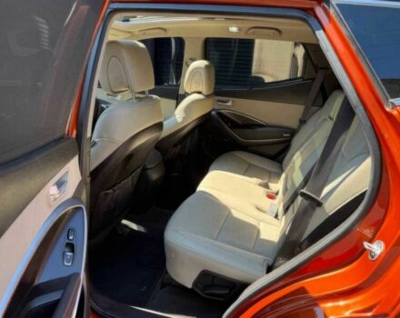 Красный Хендай Санта Фе, объемом двигателя 2 л и пробегом 50 тыс. км за 12500 $, фото 13 на Automoto.ua