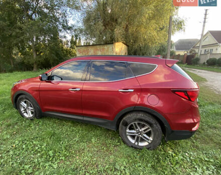 Красный Хендай Санта Фе, объемом двигателя 2.4 л и пробегом 102 тыс. км за 18550 $, фото 1 на Automoto.ua