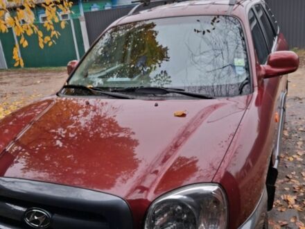 Красный Хендай Санта Фе, объемом двигателя 2 л и пробегом 120 тыс. км за 8500 $, фото 1 на Automoto.ua