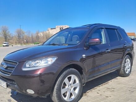 Красный Хендай Санта Фе, объемом двигателя 2.7 л и пробегом 185 тыс. км за 9700 $, фото 1 на Automoto.ua