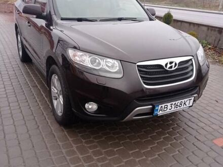 Червоний Хендай Санта Фе, об'ємом двигуна 2.36 л та пробігом 204 тис. км за 13600 $, фото 1 на Automoto.ua