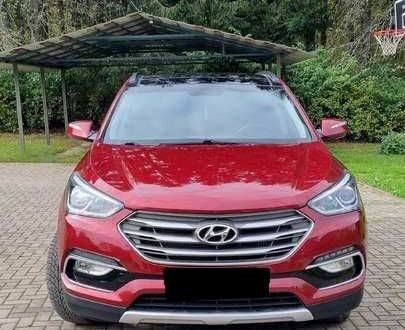 Хендай Санта Фе 2017 в Киеве на Automoto.ua Красный Хендай Санта Фе, объемом двигателя 0 л и пробегом 92 тыс. км за 11400 $, фото 1 на Automoto.ua