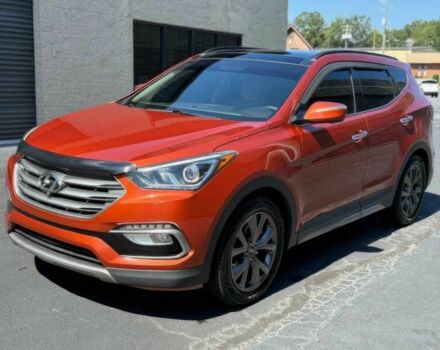 Красный Хендай Санта Фе, объемом двигателя 2 л и пробегом 50 тыс. км за 12500 $, фото 1 на Automoto.ua