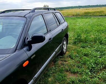 Хендай Санта Фе, об'ємом двигуна 2 л та пробігом 450 тис. км за 3010 $, фото 3 на Automoto.ua