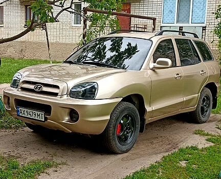 Жовтий Хендай Санта Фе, об'ємом двигуна 2.4 л та пробігом 400 тис. км за 6500 $, фото 4 на Automoto.ua