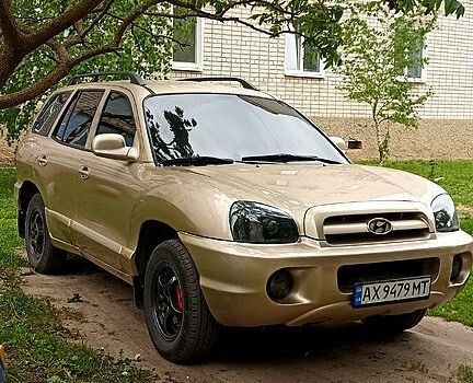 Жовтий Хендай Санта Фе, об'ємом двигуна 2.4 л та пробігом 400 тис. км за 6500 $, фото 3 на Automoto.ua
