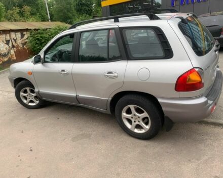 Серый Хендай Санта Фе, объемом двигателя 2.4 л и пробегом 140 тыс. км за 3200 $, фото 1 на Automoto.ua