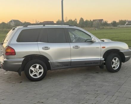 Серый Хендай Санта Фе, объемом двигателя 2 л и пробегом 300 тыс. км за 2999 $, фото 2 на Automoto.ua