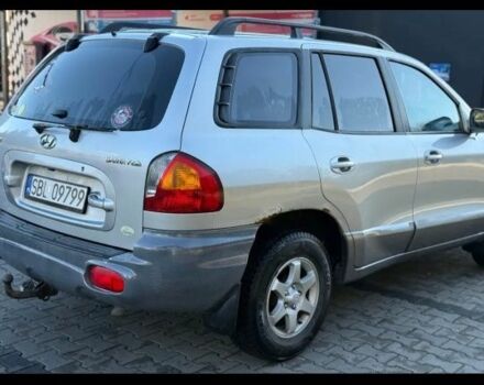 Серый Хендай Санта Фе, объемом двигателя 2 л и пробегом 235 тыс. км за 3346 $, фото 2 на Automoto.ua