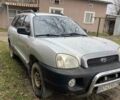 Серый Хендай Санта Фе, объемом двигателя 2.4 л и пробегом 250 тыс. км за 5000 $, фото 4 на Automoto.ua