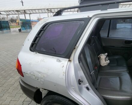 Серый Хендай Санта Фе, объемом двигателя 2.7 л и пробегом 327 тыс. км за 4000 $, фото 3 на Automoto.ua