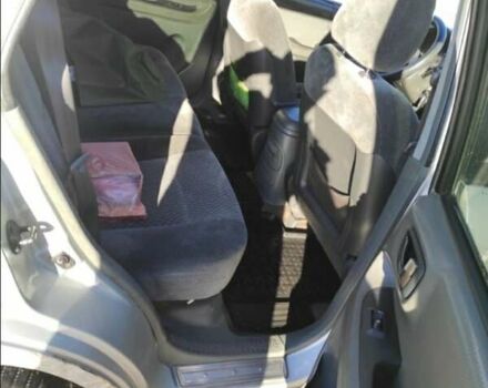 Серый Хендай Санта Фе, объемом двигателя 2 л и пробегом 312 тыс. км за 6000 $, фото 7 на Automoto.ua