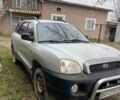 Серый Хендай Санта Фе, объемом двигателя 2.4 л и пробегом 250 тыс. км за 5000 $, фото 1 на Automoto.ua