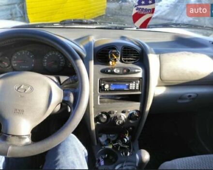 Серый Хендай Санта Фе, объемом двигателя 2 л и пробегом 312 тыс. км за 6000 $, фото 5 на Automoto.ua