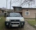 Серый Хендай Санта Фе, объемом двигателя 2.4 л и пробегом 250 тыс. км за 5000 $, фото 1 на Automoto.ua