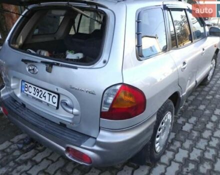 Серый Хендай Санта Фе, объемом двигателя 2 л и пробегом 312 тыс. км за 6000 $, фото 4 на Automoto.ua