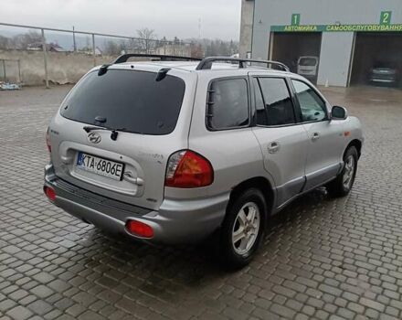 Серый Хендай Санта Фе, объемом двигателя 1.99 л и пробегом 350 тыс. км за 4200 $, фото 3 на Automoto.ua
