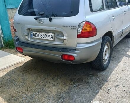 Серый Хендай Санта Фе, объемом двигателя 2.4 л и пробегом 235 тыс. км за 5100 $, фото 1 на Automoto.ua