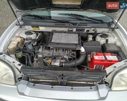 Серый Хендай Санта Фе, объемом двигателя 1.99 л и пробегом 350 тыс. км за 4200 $, фото 10 на Automoto.ua