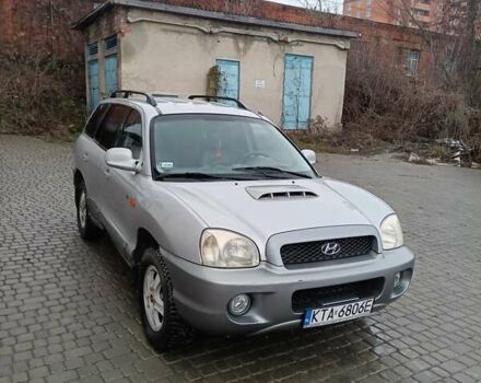 Серый Хендай Санта Фе, объемом двигателя 1.99 л и пробегом 350 тыс. км за 4200 $, фото 1 на Automoto.ua