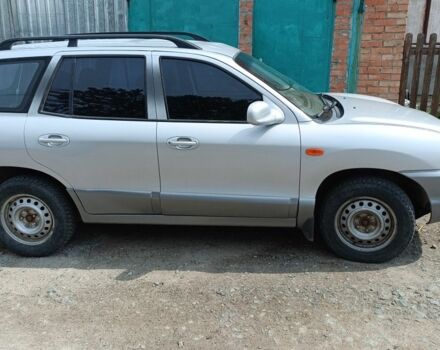 Серый Хендай Санта Фе, объемом двигателя 2.4 л и пробегом 235 тыс. км за 5100 $, фото 3 на Automoto.ua