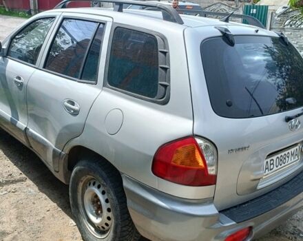 Серый Хендай Санта Фе, объемом двигателя 2.4 л и пробегом 235 тыс. км за 5100 $, фото 2 на Automoto.ua