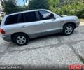 Серый Хендай Санта Фе, объемом двигателя 2 л и пробегом 247 тыс. км за 4600 $, фото 2 на Automoto.ua