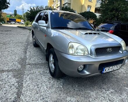 Серый Хендай Санта Фе, объемом двигателя 2 л и пробегом 247 тыс. км за 4600 $, фото 1 на Automoto.ua