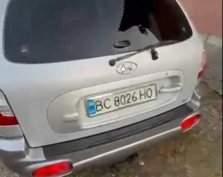 Серый Хендай Санта Фе, объемом двигателя 2 л и пробегом 270 тыс. км за 6000 $, фото 4 на Automoto.ua