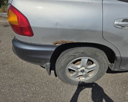 Серый Хендай Санта Фе, объемом двигателя 2 л и пробегом 343 тыс. км за 2999 $, фото 2 на Automoto.ua