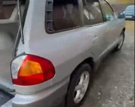 Серый Хендай Санта Фе, объемом двигателя 2 л и пробегом 270 тыс. км за 6000 $, фото 2 на Automoto.ua