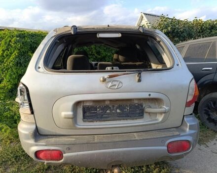 Серый Хендай Санта Фе, объемом двигателя 2.3 л и пробегом 230 тыс. км за 1071 $, фото 2 на Automoto.ua