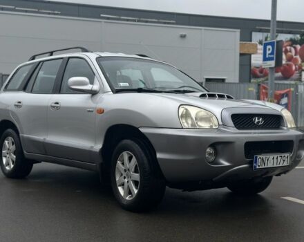 Серый Хендай Санта Фе, объемом двигателя 2 л и пробегом 241 тыс. км за 3159 $, фото 1 на Automoto.ua