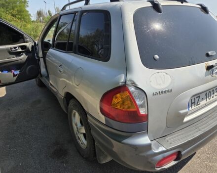 Серый Хендай Санта Фе, объемом двигателя 2 л и пробегом 343 тыс. км за 2999 $, фото 4 на Automoto.ua