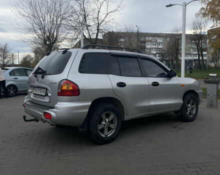 Серый Хендай Санта Фе, объемом двигателя 2 л и пробегом 300 тыс. км за 4600 $, фото 2 на Automoto.ua