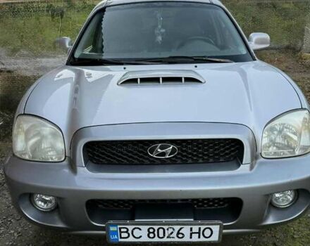 Серый Хендай Санта Фе, объемом двигателя 2 л и пробегом 270 тыс. км за 6000 $, фото 1 на Automoto.ua