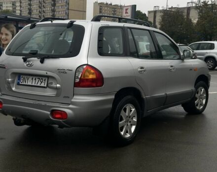 Серый Хендай Санта Фе, объемом двигателя 2 л и пробегом 241 тыс. км за 3159 $, фото 3 на Automoto.ua
