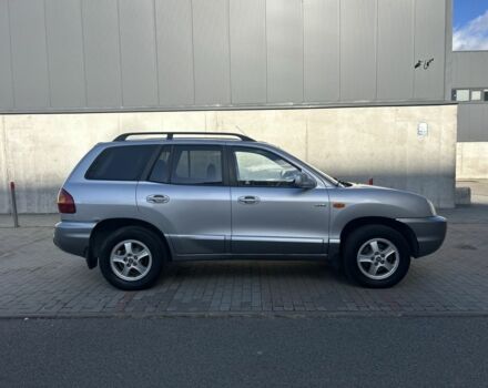 Серый Хендай Санта Фе, объемом двигателя 2 л и пробегом 357 тыс. км за 3700 $, фото 1 на Automoto.ua