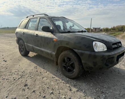 Серый Хендай Санта Фе, объемом двигателя 2.4 л и пробегом 300 тыс. км за 2200 $, фото 2 на Automoto.ua