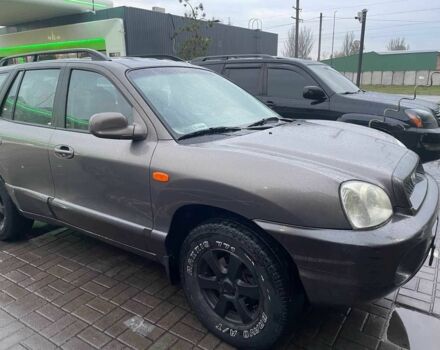 Серый Хендай Санта Фе, объемом двигателя 2 л и пробегом 280 тыс. км за 3800 $, фото 1 на Automoto.ua