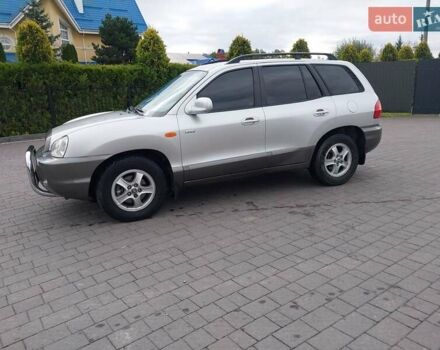 Серый Хендай Санта Фе, объемом двигателя 1.99 л и пробегом 300 тыс. км за 5650 $, фото 1 на Automoto.ua