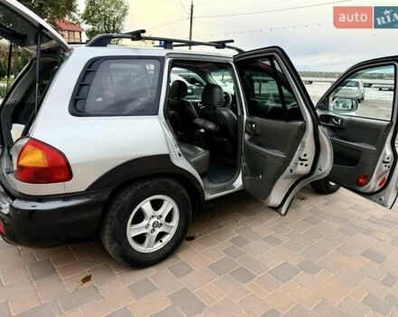 Серый Хендай Санта Фе, объемом двигателя 3.49 л и пробегом 319 тыс. км за 5300 $, фото 21 на Automoto.ua