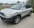 Серый Хендай Санта Фе, объемом двигателя 2.4 л и пробегом 260 тыс. км за 4200 $, фото 2 на Automoto.ua