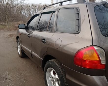 Серый Хендай Санта Фе, объемом двигателя 2.4 л и пробегом 320 тыс. км за 4500 $, фото 3 на Automoto.ua